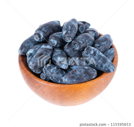 Honeysuckle in wooden bowl, isolated on white background. Fresh honeysuckle blue berry fruits. Clipping path. 115595653