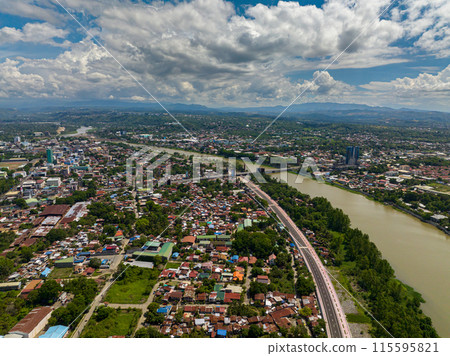 River and residential area in Cagayan de Oro in Northern Mindanao, Philippines. River and residential area in Cagayan de Oro in Northern Mindanao, Philippines. 115595821