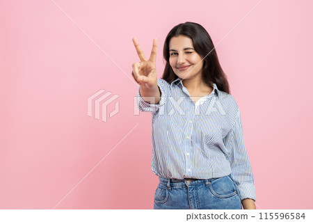 Cute Indian woman showing v sign 115596584