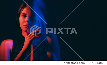 Mental disorder. Defocused woman. Fake calm female silhouette suffering dissociative identity red neon color empty space double exposure out of focus. 115596866