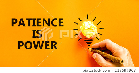 Patience is power symbol. Concept words Patience is power on beautiful orange paper. Beautiful orange background. Light bulb icon. Businessman hand. Business and patience is power concept. Copy space. 115597908
