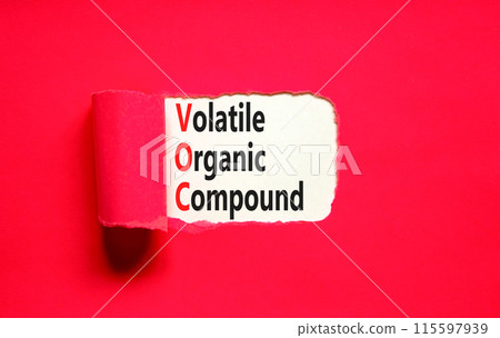 VOC volatile organic compound symbol. Concept words VOC volatile organic compound on beautiful white paper. Beautiful red background. Business VOC volatile organic compound concept. Copy space. 115597939