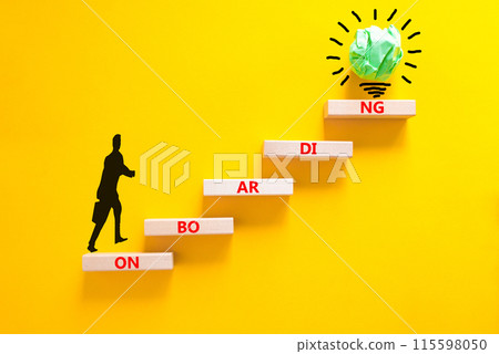 Onboarding success symbol. Concept word Onboarding on wooden blocks. Businessman icon. Beautiful yellow background. Business onboarding success concept. Copy space. Onboarding success symbol. Concept word Onboarding on wooden blocks. Businessman icon. Beautiful yellow background. Business onboarding success concept. Copy space. 115598050