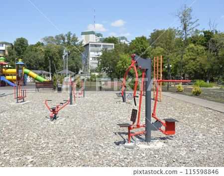 street exercise equipment at the school stadium. outdoor sports 115598846