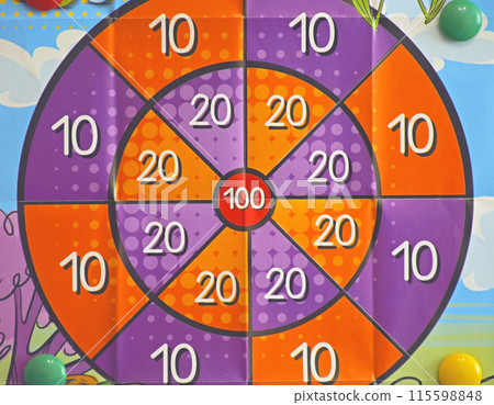 playing field for children's game of darts with darts and balls 115598848