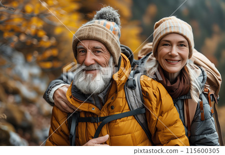 Portrait Of Senior Couple Hiking Through Countryside 115600305