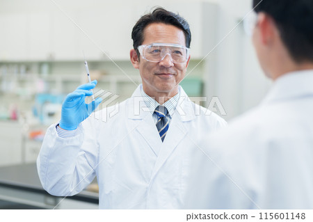 Injection syringe researcher Injection syringe researcher 115601148