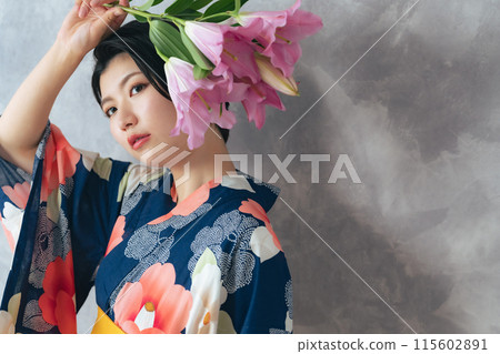 Portrait of a woman wearing a yukata Portrait of a woman wearing a yukata 115602891