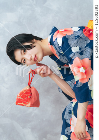 Portrait of a woman wearing a yukata 115602893