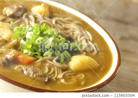 Hot curry soba noodles with plenty of spring onions Hot curry soba noodles with plenty of spring onions 115603504