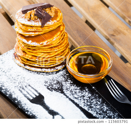 Pancakes with honey and chocolate 115603791