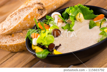 Mushrooms cream soup with grain baguette Mushrooms cream soup with grain baguette 115603792
