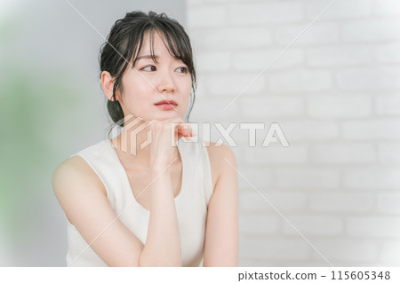 Smiling Asian woman in sleeveless clothes for beauty, skincare and diet images Smiling Asian woman in sleeveless clothes for beauty, skincare and diet images 115605348