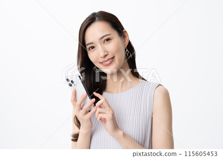 A young woman using a smartphone A young woman using a smartphone 115605453