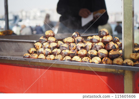 traditional Istanbul street food grilled chestnuts in a row traditional Istanbul street food grilled chestnuts in a row 115605606