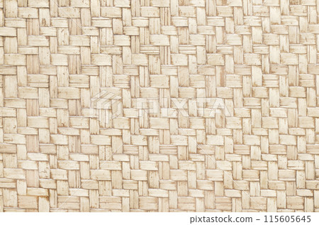 Old bamboo weaving pattern, woven rattan mat texture for background and design art work. Old bamboo weaving pattern, woven rattan mat texture for background and design art work. 115605645