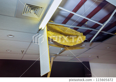 Damaged ceilings are demolitions during renovations of commercial premises 115605872