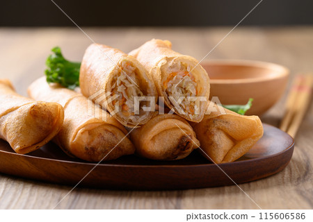 Asian deep fried spring roll filling with cabbage, carrot and glass noodles Asian deep fried spring roll filling with cabbage, carrot and glass noodles 115606586