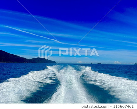 A ship's rushing waves in the blue sky A ship's rushing waves in the blue sky 115607461