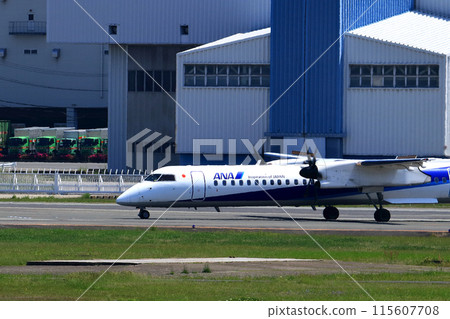 Osaka International Airport ANA Bombardier DHC8-Q400 Propeller Aircraft Takeoff Ready Sky Park 115607708