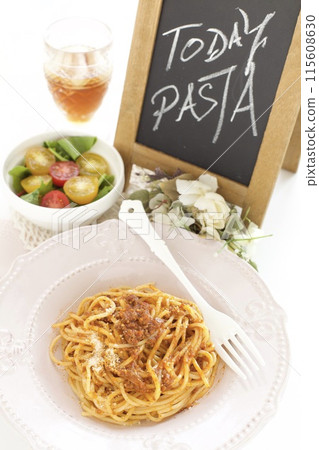 Italian pasta bolognese and raw vegetable salad Italian pasta bolognese and raw vegetable salad 115608630