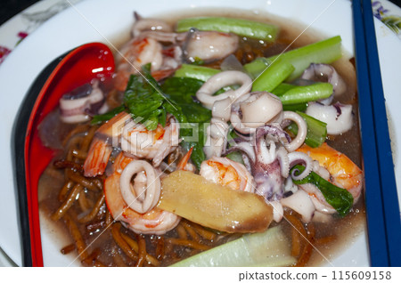 Close up view of Gravy noodle served with seafood. Asian food concept 115609158