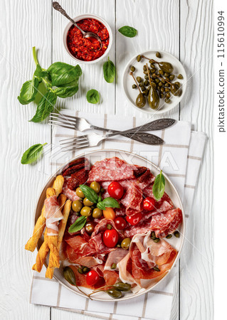 italian antipasto plate of cured meat and veggies italian antipasto plate of cured meat and veggies 115610994