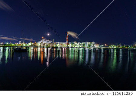 Factory night view reflected on the surface of the water Factory night view reflected on the surface of the water 115611220