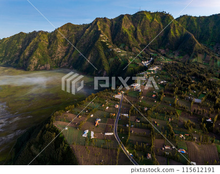 Village and Cliff at Bromo Volcano in Tengger Semeru, Java, Indonesia Village and Cliff at Bromo Volcano in Tengger Semeru, Java, Indonesia 115612191