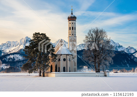 St. Coloman church near to Neuschwanstein castle with Tannheimer mountains in winter, Allgau, Germany 115612193