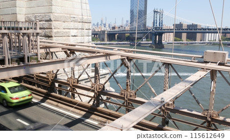 Cars on Brooklyn Bridge, New York City. Green boro taxi cab, road traffic and architecture, USA. Cars on Brooklyn Bridge, New York City. Green boro taxi cab, road traffic and architecture, USA. 115612649