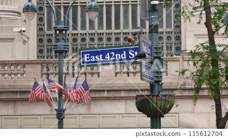 New York City Grand Central Terminal, 42 street sign, Park Avenue, Pershing Square. American flag. 115612704