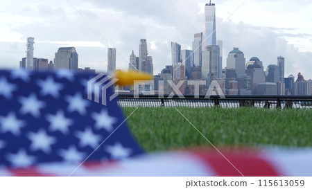 New York City waterfront skyline, Manhattan Downtown World Trade Center cityscape. American USA flag New York City waterfront skyline, Manhattan Downtown World Trade Center cityscape. American USA flag 115613059
