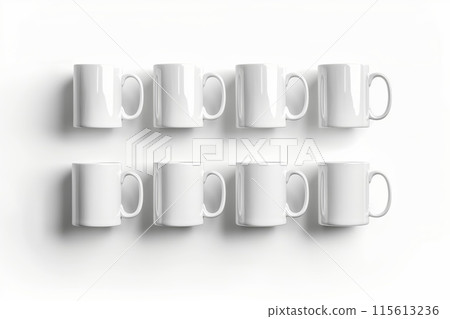 Top view of various white mugs aligned on a clean, white surface, creating a minimalist design 115613236