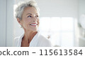 Smiling middle aged woman 115613584