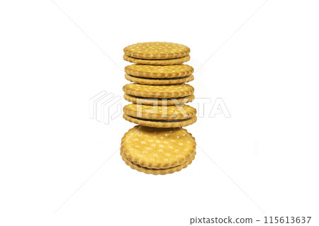 On a light background a round biscuit with chocolate filling On a light background a round biscuit with chocolate filling 115613637