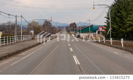 A straight road (Shihoro Town, Hokkaido) 115615275