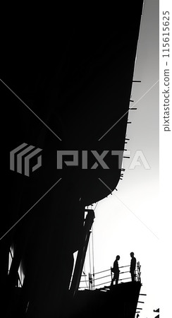 Silhouette of a builders against the background of a building under construction, 115615625