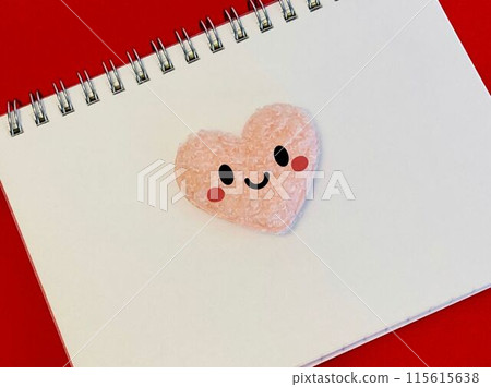 Notebook and smiling heart Notebook and smiling heart 115615638