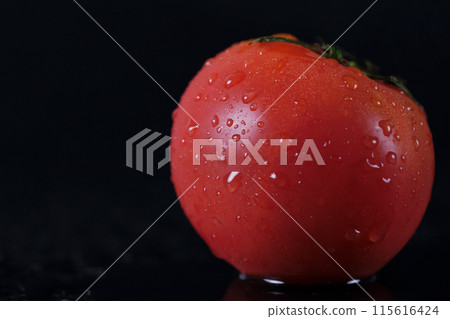 Ripe, fresh, delicious looking red tomatoes with water drops Ripe, fresh, delicious looking red tomatoes with water drops 115616424