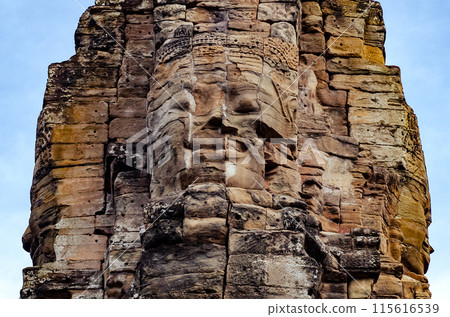 The bayon temple smiling stone faces showing on a sunny day in angkor thom, siem reap, cambodia 115616539