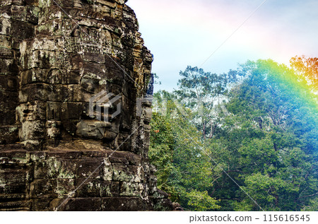 The bayon temple smiling stone faces showing on a sunny day in angkor thom, siem reap, cambodia 115616545