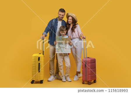 A cheerful family of three is planning their holiday adventure, with a young child holding a map, excitedly pointing out a location, as his parents, carrying colorful suitcases A cheerful family of three is planning their holiday adventure, with a young child holding a map, excitedly pointing out a location, as his parents, carrying colorful suitcases 115618993