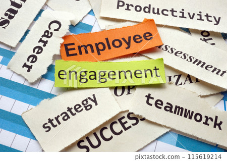 Pieces of paper with words employee engagement. Pieces of paper with words employee engagement. 115619214