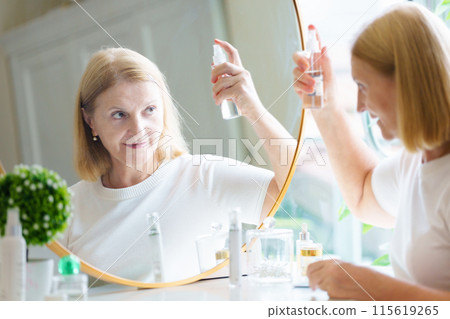 Skin care for senior woman. Anti-aging cream. Skin care for senior woman. Anti-aging cream. 115619265