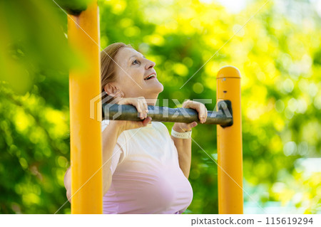 Elderly woman exercising. Fit senior lady running. Elderly woman exercising. Fit senior lady running. 115619294