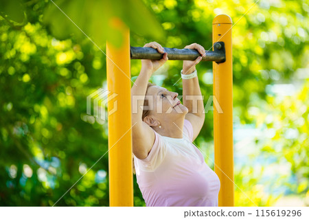 Elderly woman exercising. Fit senior lady running. Elderly woman exercising. Fit senior lady running. 115619296