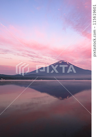 A spectacular view of the sunrise and inverted Mt. Fuji from Lake Yamanaka in early summer A spectacular view of the sunrise and inverted Mt. Fuji from Lake Yamanaka in early summer 115619601