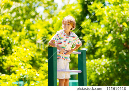 Child on playground. Active kid in school yard. Child on playground. Active kid in school yard. 115619618