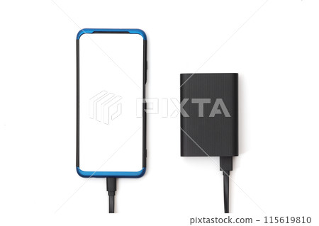 Smartphone and external battery for charging devices isolated on white. Top view 115619810